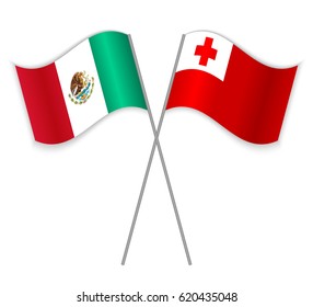 Mexican and Tongan crossed flags. Mexico combined with Tonga isolated on white. Language learning, international business or travel concept.