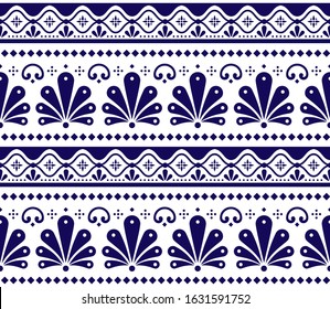 Mexican vector seamless pattern inpired by traditional pottery and ceramics art Talavera Poblana. Retro floral and goemetric ornament inspired by handmade Puebla pottery from Mexico in navy blue 