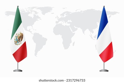 Mexico and France flags for official meeting against background of world map.