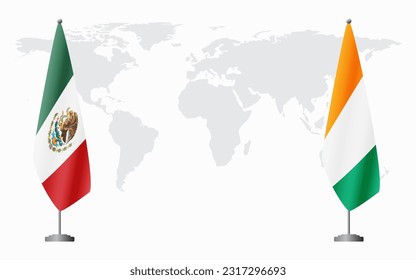 Mexico and Ivory Coast flags for official meeting against background of world map.