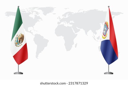 Mexico and Sint Maarten flags for official meeting against background of world map.
