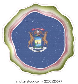 Michigan Fahne im Rahmen. Abzeichen des US-Bundesstaates. Geländetes kreisförmiges Schild um die Flagge von Michigan. Moderne Vektorgrafik.