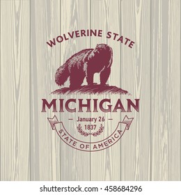 Michigan Wolverine State, stylized emblem of the state of America, Wolverine, on wooden background