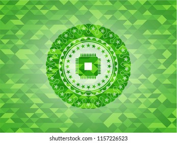 microchip, microprocessor icon inside green emblem with triangle mosaic background