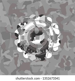 microchip, microprocessor icon inside grey camo emblem