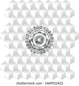 microchip, microprocessor icon inside grey badge with geometric cube white background