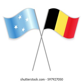 Micronesian and Belgian crossed flags. Micronesia combined with Belgium isolated on white. Language learning, international business or travel concept.