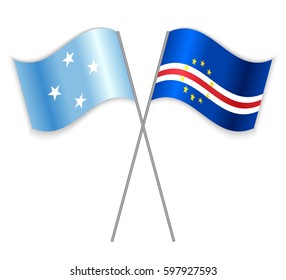 Micronesian and Cabo Verdean crossed flags. Micronesia combined with Cape Verde isolated on white. Language learning, international business or travel concept.