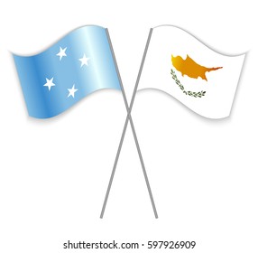 Micronesian and Cypriot crossed flags. Micronesia combined with Cyprus isolated on white. Language learning, international business or travel concept.