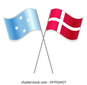 Micronesian and Danish crossed flags. Micronesia combined with Denmark isolated on white. Language learning, international business or travel concept.
