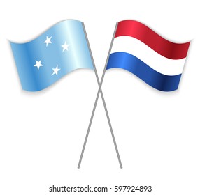 Micronesian and Dutch crossed flags. Micronesia combined with Netherlands isolated on white. Language learning, international business or travel concept.