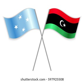 Micronesian and Libyan crossed flags. Micronesia combined with Libya isolated on white. Language learning, international business or travel concept.