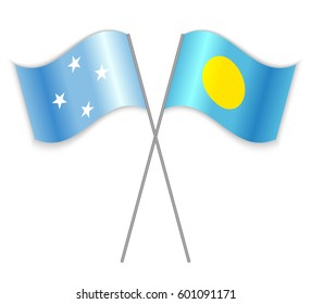 Micronesian and Palauan crossed flags. Micronesia combined with Palau isolated on white. Language learning, international business or travel concept.