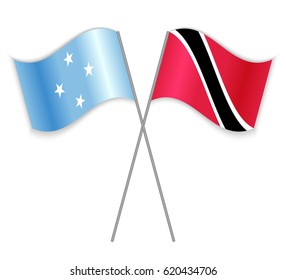 Micronesian and Trinidadian crossed flags. Micronesia combined with Trinidad and Tobago isolated on white. Language learning, international business or travel concept.