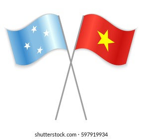 Micronesian and Vietnamese crossed flags. Micronesia combined with Vietnam isolated on white. Language learning, international business or travel concept.