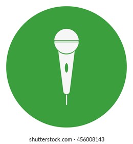 The microphone in the classic flat style.Vector icon.