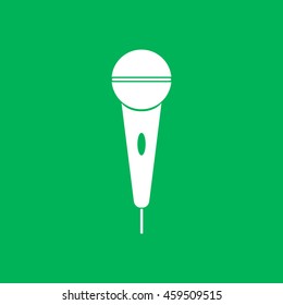 The microphone in the classic flat style.Vector icon.