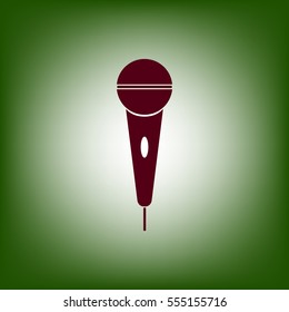 The microphone in the classic flat style.Vector icon.