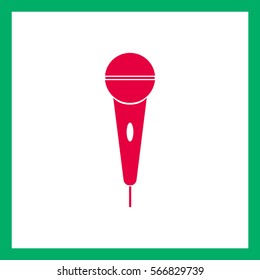The microphone in the classic flat style.Vector icon.