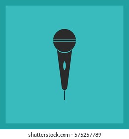 The microphone in the classic flat style.Vector icon.