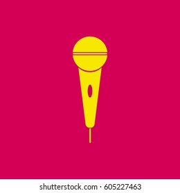 The microphone in the classic flat style.Vector icon.