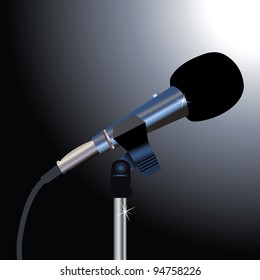 Microphone with a cord on a black background