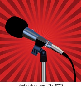 Microphone with a cord on a red background