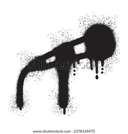 Microphone graffiti with black spray paint	
