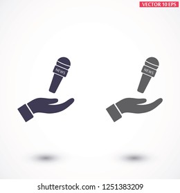 Microphone in hand icon
