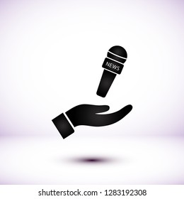 Microphone in hand icon