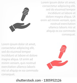 Microphone in hand icon