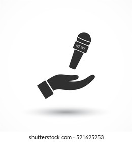 Microphone in hand icon
