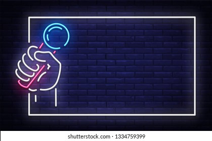 Microphone in Hand Neon Signboard in Frame Vector. Live music neon sign, stand up design template or night neon signboard for advertising, light banner. Vector