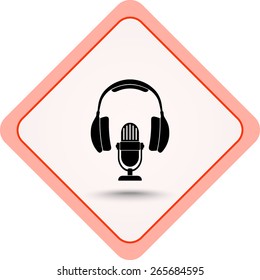 Microphone with headphones sign icon, vector illustration. Flat design style