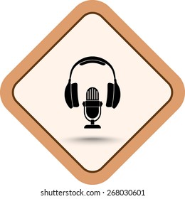 Microphone with headphones sign icon, vector illustration. Flat design style