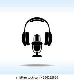 Microphone with headphones sign icon, vector illustration. Flat design style