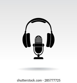 Microphone with headphones sign icon, vector illustration. Flat design style