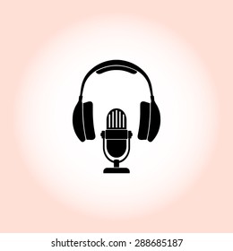 Microphone with headphones sign icon, vector illustration. Flat design style