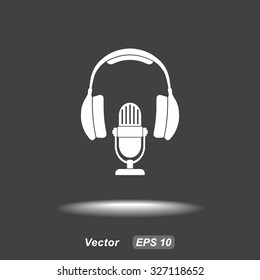 Microphone with headphones sign icon, vector illustration. Flat design style