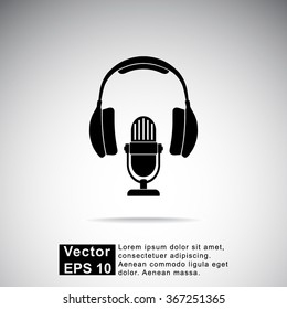 Microphone with headphones sign icon, vector illustration. Flat design style