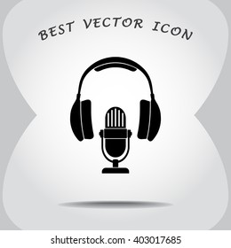 Microphone with headphones sign icon, vector illustration. Flat design style