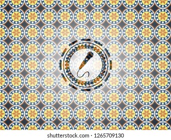 microphone icon inside arabesque style badge. arabic decoration.