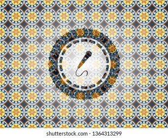 microphone icon inside arabesque style badge. arabic decoration.