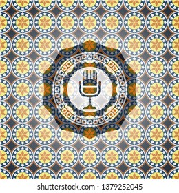 microphone icon inside arabesque style emblem. arabic decoration.