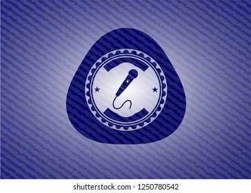 microphone icon inside badge with jean texture