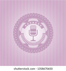microphone icon inside badge with pink background
