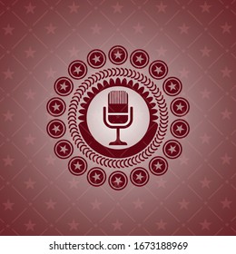microphone icon inside badge with red background