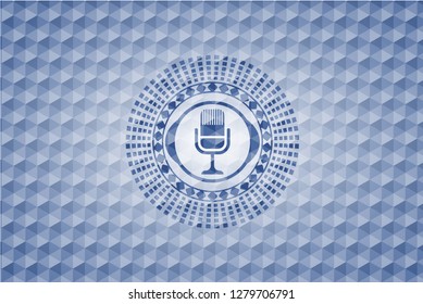 microphone icon inside blue badge with geometric pattern.