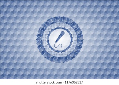 microphone icon inside blue emblem with geometric pattern.