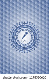 microphone icon inside blue emblem or badge with abstract geometric polygonal pattern background.